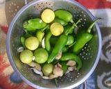 A picture of step 1 of Green chilli and lemon pickle.