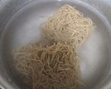 A picture of step 2 of Egg fried noodles.