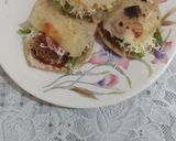 A picture of step 6 of Pita bread with falafel and tahini sauce.
