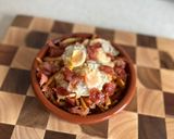Foto del paso 6 de la receta: Nido de patatas paja con huevos de codorniz y crujiente de jamón