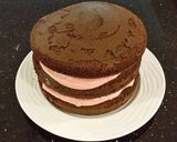 A picture of step 18 of Dark Chocolate Layer Cake with Fresh Strawberry Cream Frosting and Filling.