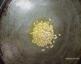 A picture of step 1 of Gajar halwa.