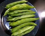 A picture of step 1 of Semi Lima beans fry with potato.