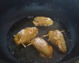 A picture of step 4 of Chicken stuffed squid.