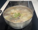 A picture of step 5 of Clam, Winter Melon, and Chicken Soup.