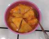 A picture of step 2 of Coated fried yam.