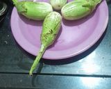 A picture of step 1 of Multigrain Atta Brinjal & Curd Thalipith.