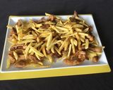 Foto del paso 11 de la receta Secreto ibérico de papada con patatas y pimientos del padrón