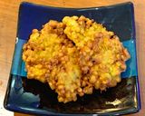 A picture of step 7 of Indonesian deep fried corn fritters.