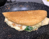 Foto del paso 3 de la receta: Tortilla soufflé rellena de pollo y espinacas