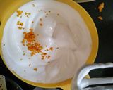 A picture of step 11 of Eggless Layered chocolate strawberry orange cake.