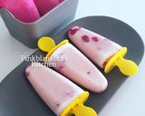A picture of step 5 of Berry Creamy Popsicles.