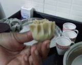 A picture of step 4 of Fried Modak.