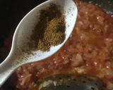 A picture of step 10 of Chicken Tangdi Masala.
