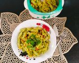 A picture of step 4 of CREAMY PESTO PASTA 😋 With BASIL Leaves.