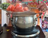A picture of step 3 of Cambodian fish and pineapple soup.