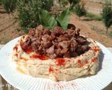 A picture of step 5 of Braised Lamb Shanks with Hummus Moutabal.