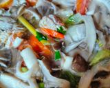 A picture of step 4 of Tom Yum Soup with Mushrooms and Shrimp.