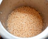 A picture of step 1 of Broken wheat sweet Pongal.