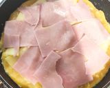 Foto del paso 3 de la receta: Tortilla de patatas rellena de jamón y queso