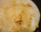 A picture of step 4 of Stuffed uttapam.