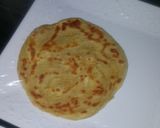 A picture of step 4 of Naan bread and chicken curry.