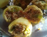 A picture of step 1 of Nawabi Cabbage paneer stuffed aloo with gravy.