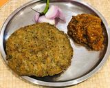 A picture of step 4 of Bajra Methi paratha.