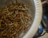 A picture of step 1 of Fried omena(small fish).