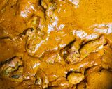 A picture of step 7 of Gravy chicken with splash of charoli seeds.