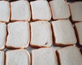 Foto del paso 2 de la receta: Torrijas de leche con cobertura de maní, al horno