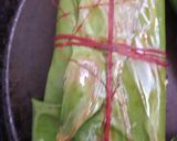 A picture of step 8 of Bhetki machher paturi/ Barramundi cooked in banana leaves.