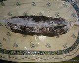 A picture of step 8 of Chocolate and biscuit salami.