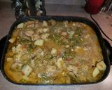 A picture of step 14 of Mike's Pork Chili Verde Burritos.