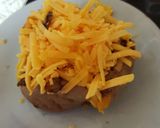 A picture of step 3 of My Sweet jacket Potato & Caralmerised Onion & Cheese.😁.
