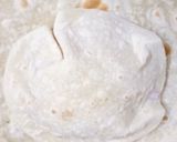 A picture of step 11 of Taco Bell crunchy wrap.