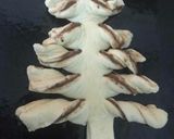 A picture of step 13 of Nutella Christmas Tree Bread.