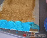 A picture of step 10 of Sandcastle Cake.