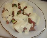 Foto del paso 9 de la receta Ternera rellena de espárragos y ajos tiernos con salsa de queso