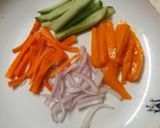A picture of step 1 of Mango salad 🥗 🥭🥒🥕🧅.