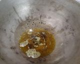 A picture of step 3 of Jhinge Chicken Posto (Chicken with Ridge gourd and poppy seeds).