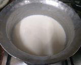 A picture of step 2 of Black current creamy icecream.