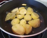 Foto del paso 2 de la receta: Patatas al horno con bacon y guisantes