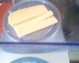 Foto del paso 5 de la receta: PAPA LIBRILLO Con jamón Salsa y queso muzzarela