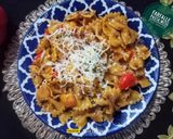 A picture of step 7 of Farfalle Pasta With Red Sauce.