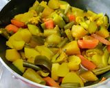 A picture of step 4 of Aviyal Sadya/Curry.