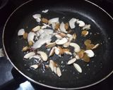 A picture of step 2 of Zarda (jaggery rice pulav).