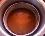 A picture of step 8 of Moist chocolate cake using table top cooker.