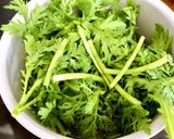 A picture of step 1 of Boiled Chrysanthemum Greens & Eggs Mashed with Fish Sauce.