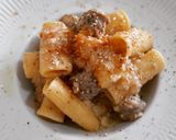 A picture of step 5 of Rigatoni with Butifarra in Roasted Garlic and Tahini Sauce.